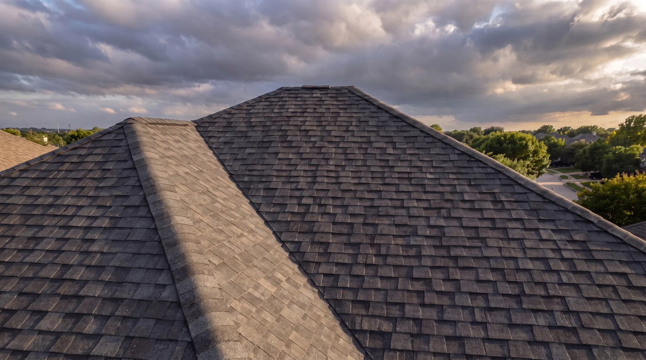 A Plano roof seen from above, two shingled planes meeting at a valley.